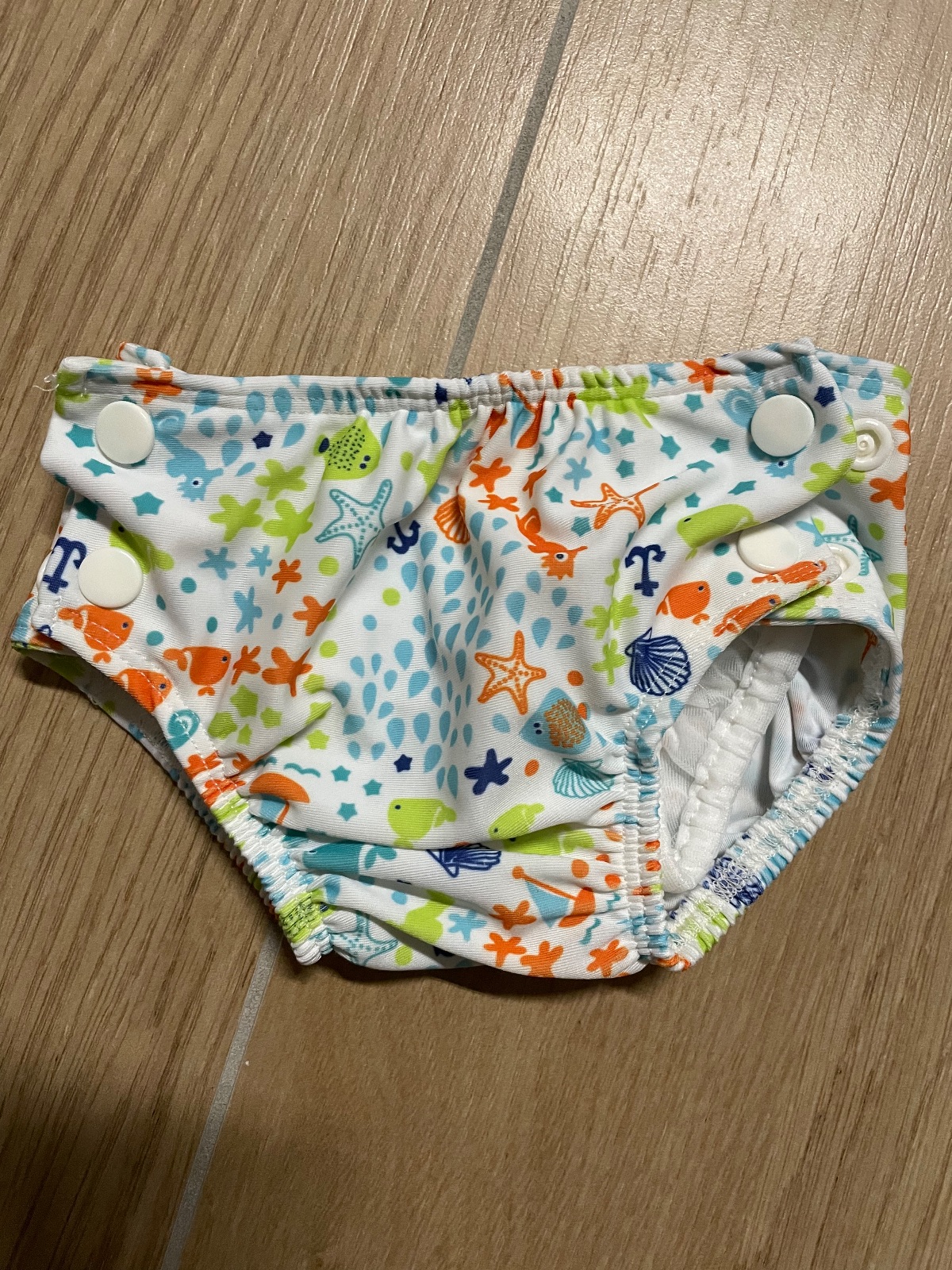 Schwimmwindeln von Blümchen und Popolini