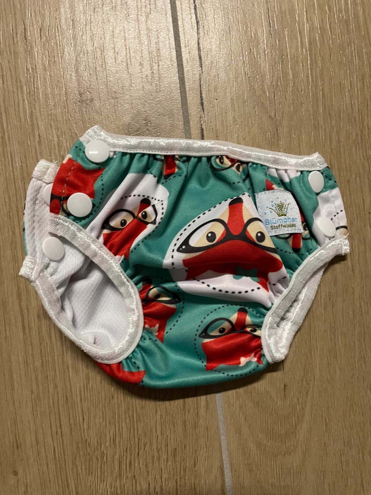 Schwimmwindeln von Blümchen und Popolini