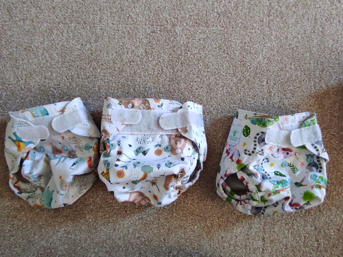 3 Blümchen Klett Überhosen Newborn Größe.