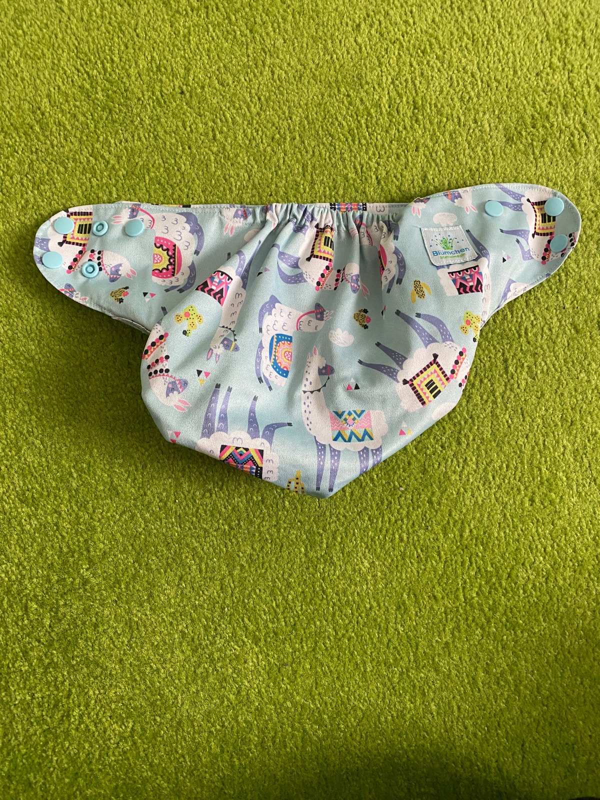 7 Blümchen Überhosen 2 Waschbeutel