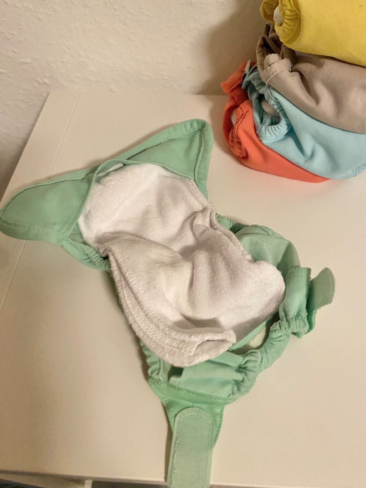Pop In Stoffwindeln 12 Außenhüllen, 20 Saugkerne, 1 Dry-Bag